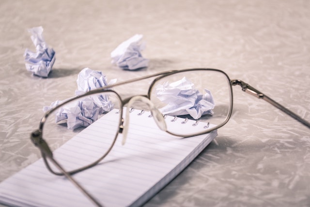 glasses on top of notebook